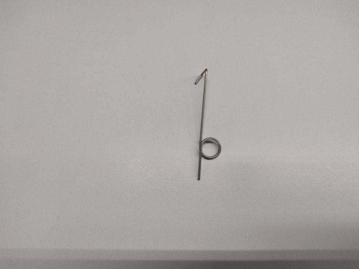 N. 1 pz. molla ganascino dx + n. 1 pz. molla ganascino sx.